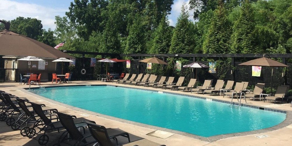 Sunloungers at New Hope Inn & Suites Outdoor Pool